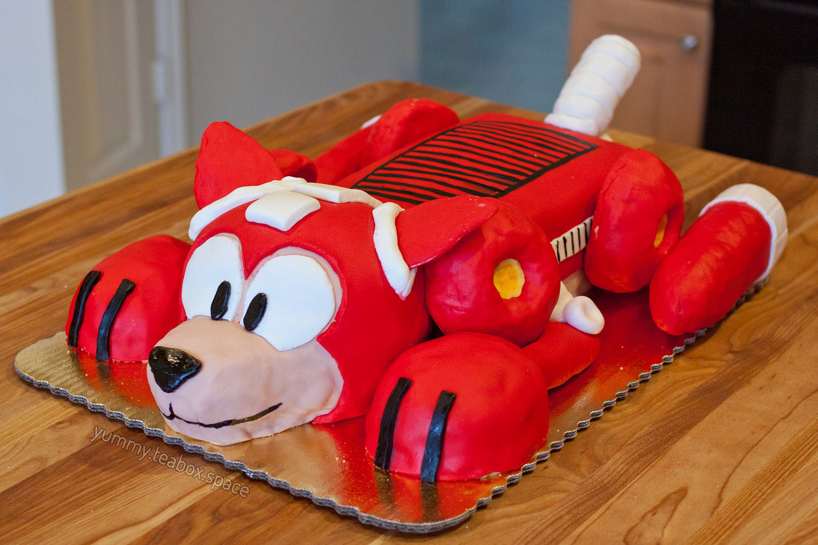 Cake that looks like the red robot dog, Rush, from Mega Man